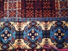Live in quetta black version ( particolare),  lana annodata a mano su ordito di cotone,  cm.180x270,  2000